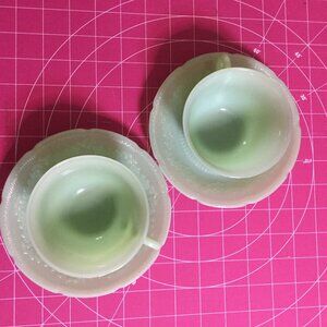 Vintage set of 2 teacups and saucers they are a jade green color no cracks/chips
